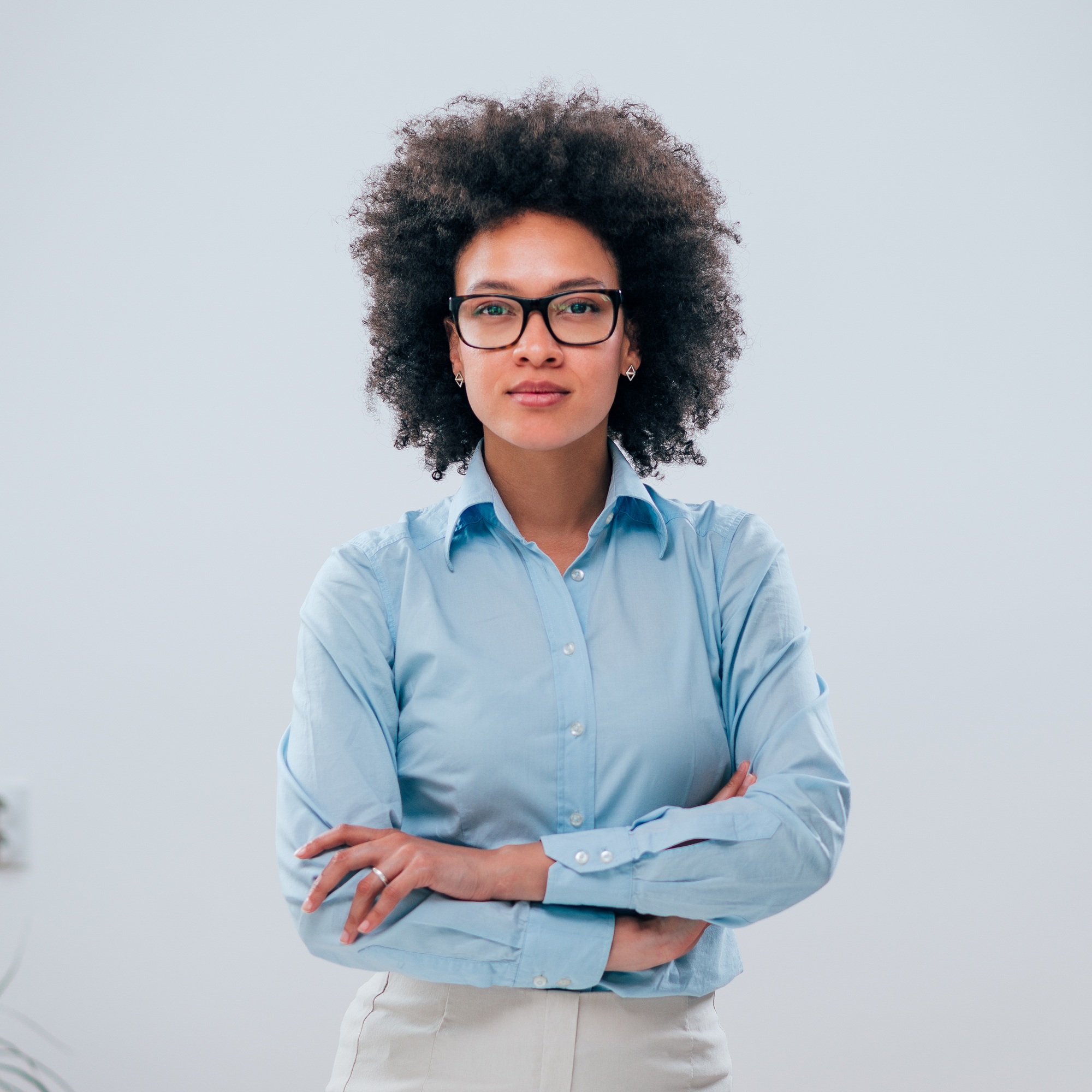 Portrait Of A Confident Businesswoman With Curly Hair On Isolated Background .jpg - Premium Structural Steel Component by Welldone Steel