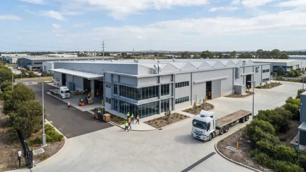 Completed prefabricated steel factory building at an industrial site